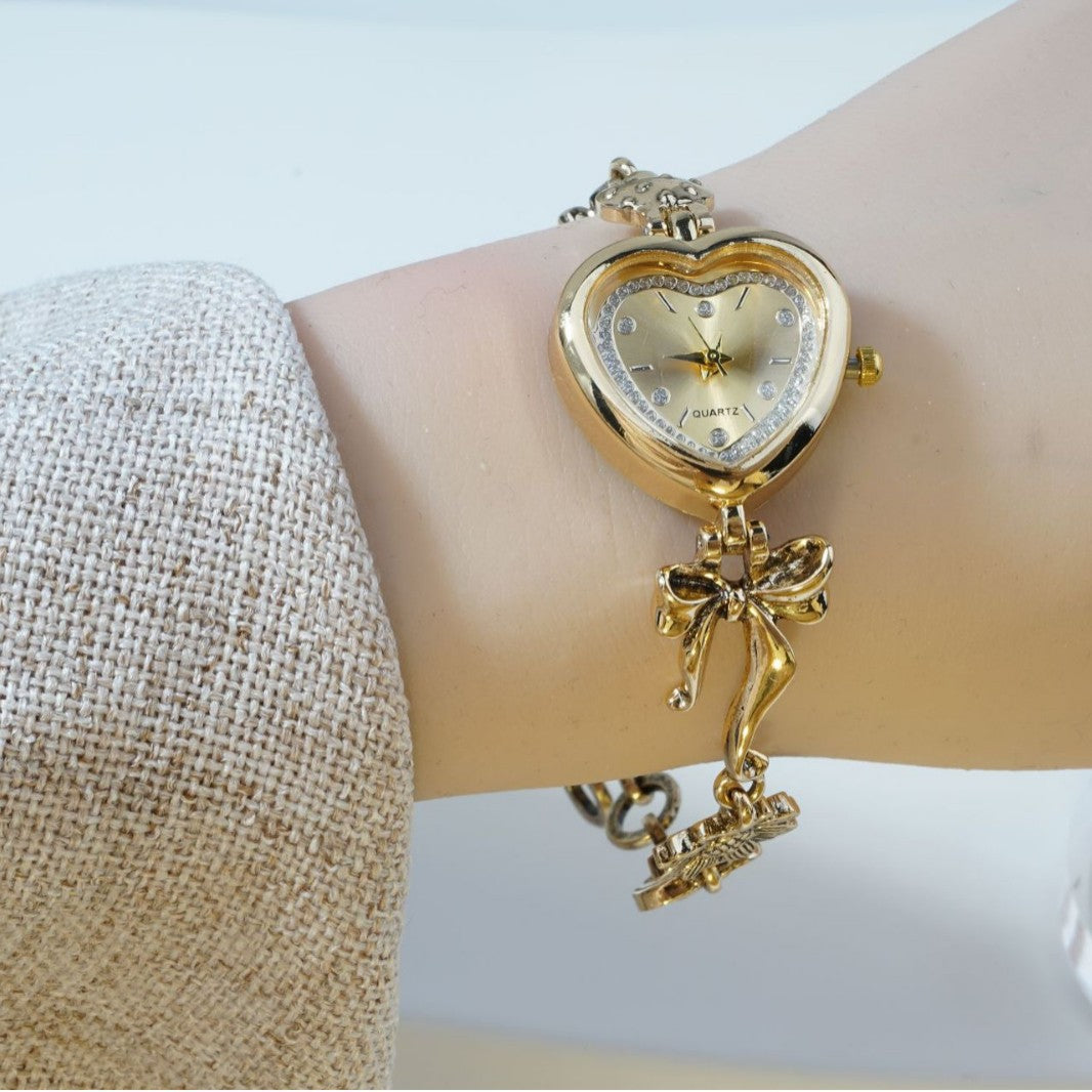 Retro Heart Bracelet Watch for Women – Gold Bow & Flower Fashion Timepiece