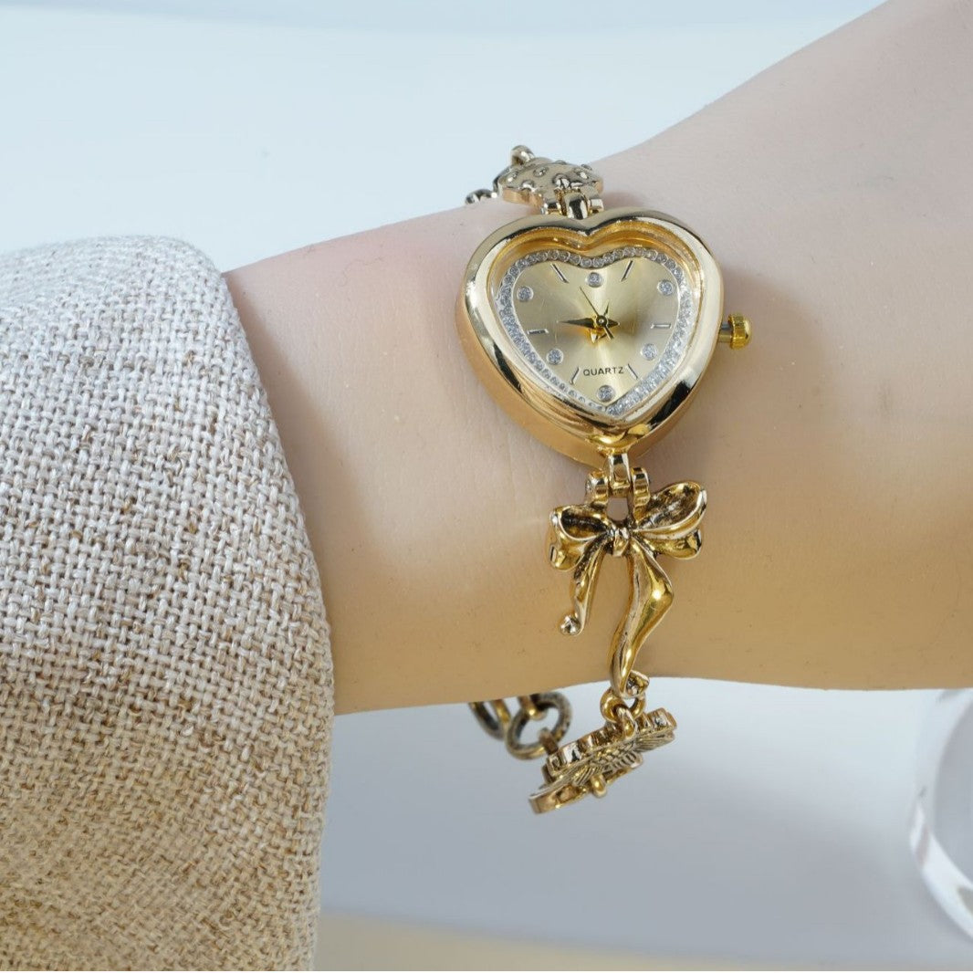 Retro Heart Bracelet Watch for Women – Gold Bow & Flower Fashion Timepiece