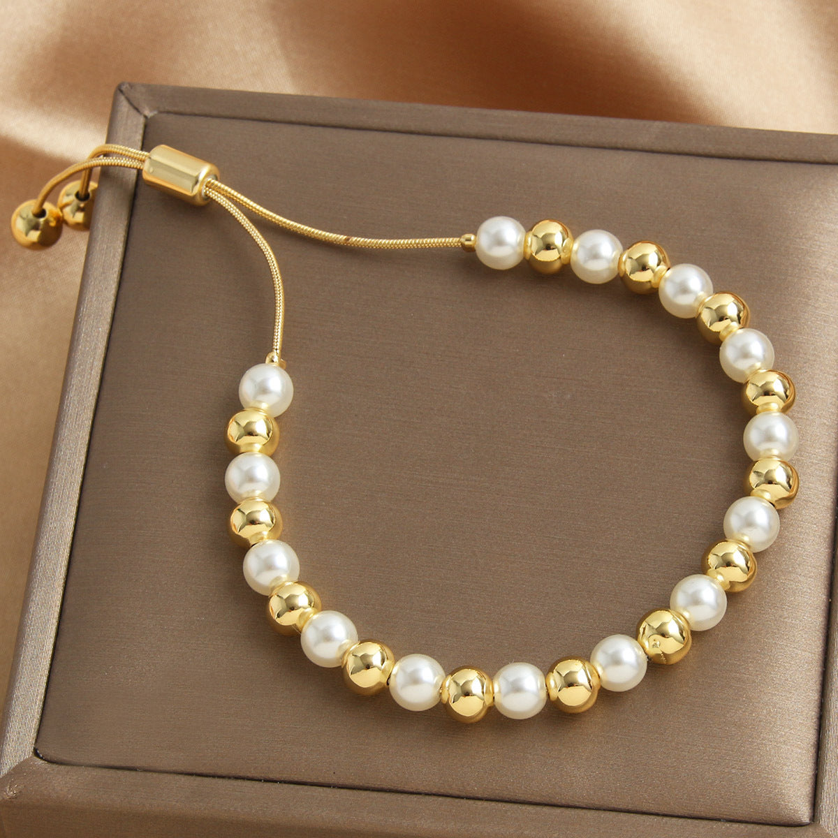 Retro-style Pearl Bracelet With A Pull-chain Design Available In Multiple Sizes And Fully Adjustable