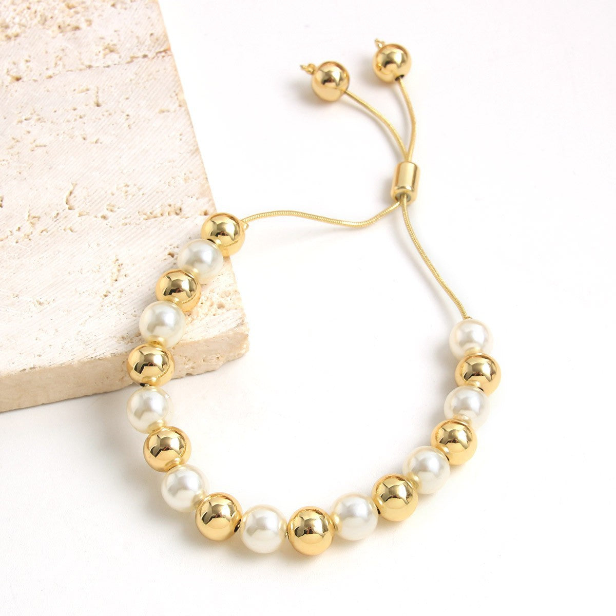 Retro-style Pearl Bracelet With A Pull-chain Design Available In Multiple Sizes And Fully Adjustable