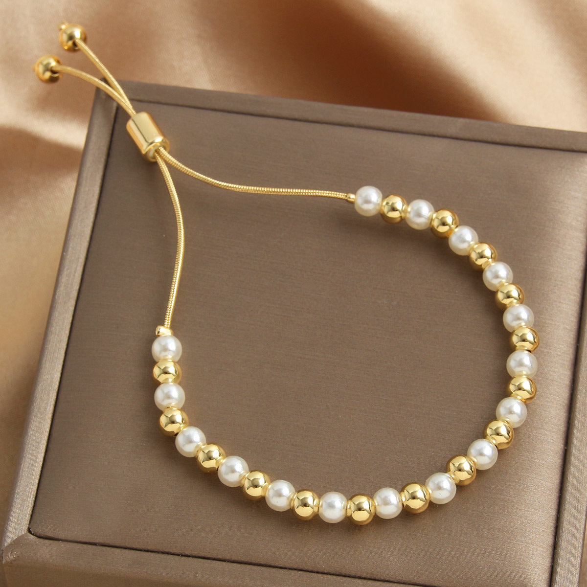 Retro-style Pearl Bracelet With A Pull-chain Design Available In Multiple Sizes And Fully Adjustable