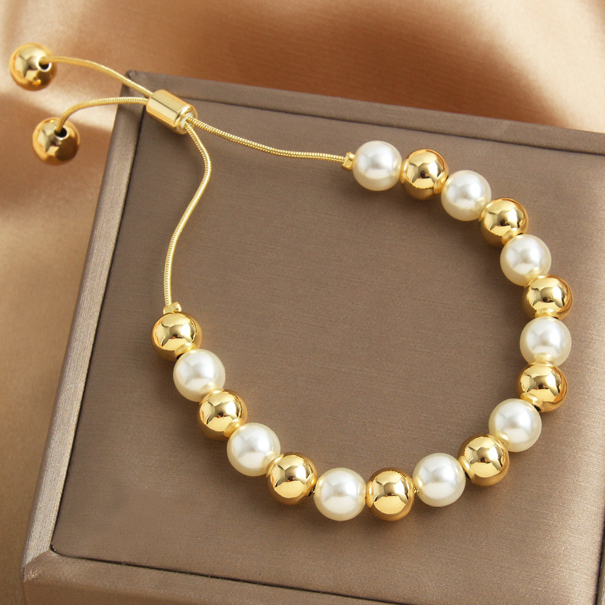 Retro-style Pearl Bracelet With A Pull-chain Design Available In Multiple Sizes And Fully Adjustable